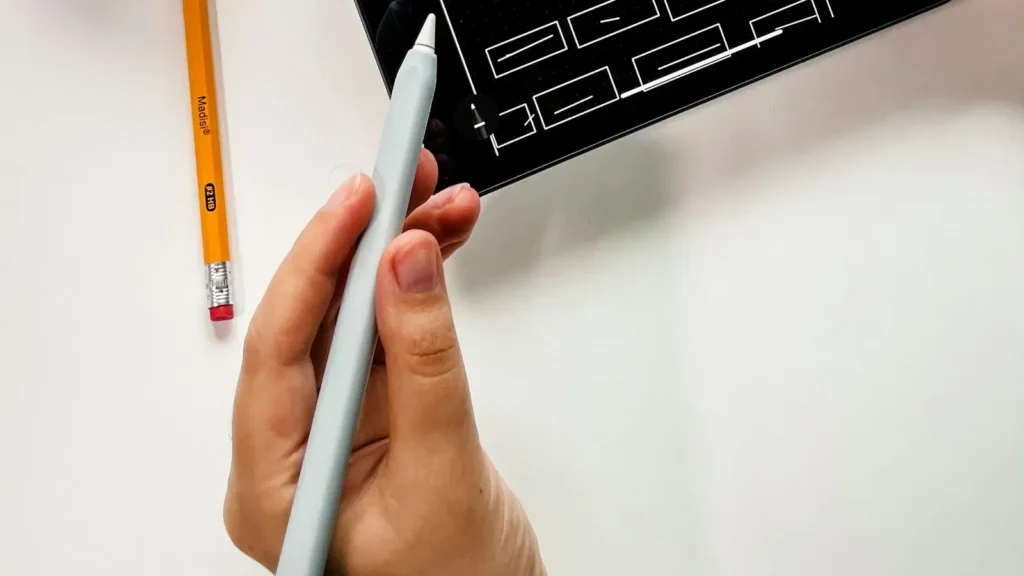 Tablet showing a page design to compare Elementor, Gutenberg and Divi