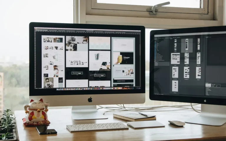 Designer workspace with two monitors for Elementor website development