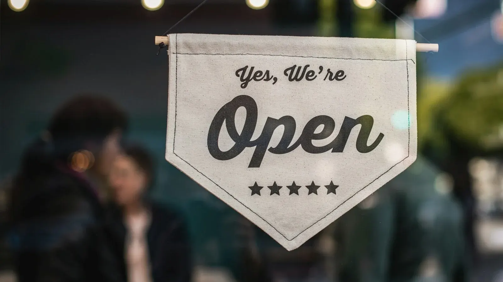 Open sign on a small business for local SEO