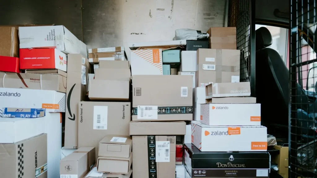 Shipping boxes for an online store comparing WooCommerce and Shopify