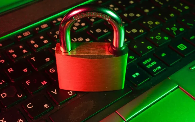 Padlock on a keyboard representing WordPress security and maintenance