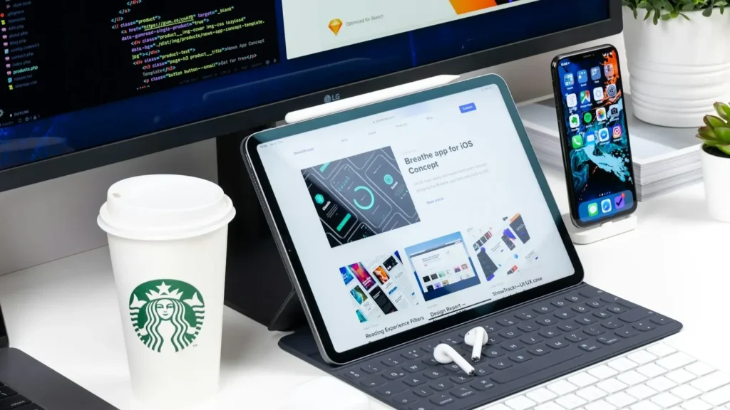 Monitor showing website products to compare WordPress, Wix and Squarespace